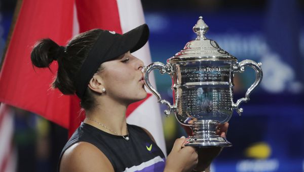 Bianca Andreescu, of Canada, kisses the championship trophy after defeating Serena Williams, of the United States, in the women's singles final of the U.S. Open tennis championships Saturday, Sept. 7, 2019, in New York. Bianca Andreescu, of Canada, kisses the championship trophy after defeating Serena Williams, of the United States, in the women's singles final of the U.S. Open tennis championships Saturday, Sept. 7, 2019, in New York. - Sputnik International