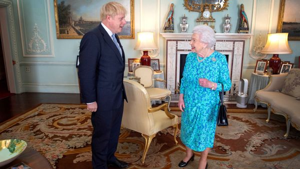 FILE PHOTO: Queen Elizabeth II welcomes Boris Johnson during an audience in Buckingham Palace, where she will officially recognise him as the new Prime Minister, in London, Britain July 24, 2019. - Sputnik International