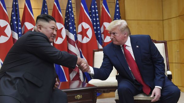 President Donald Trump meets with North Korean leader Kim Jong Un at the border village of Panmunjom in the Demilitarized Zone, South Korea, Sunday, June 30, 2019. - Sputnik International