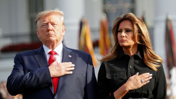 U.S. President Donald Trump and first lady Melania Trump observe a moment of silence to mark the 18th anniversary of September 11 attacks on the South Lawn of the White House in Washington, U.S., September 11, 2019 U.S. President Donald Trump and first lady Melania Trump observe a moment of silence to mark the 18th anniversary of September 11 attacks on the South Lawn of the White House in Washington, U.S., September 11, 2019 - Sputnik International
