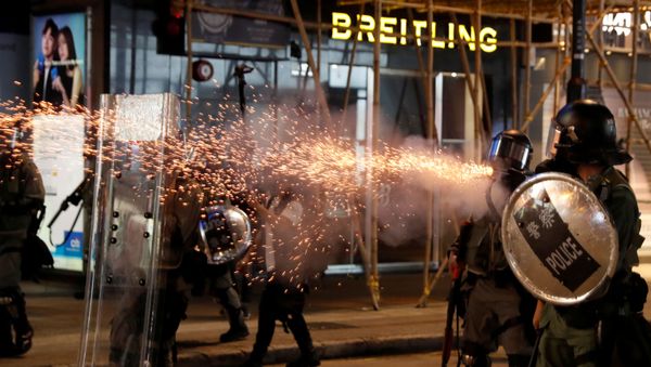 Riot police fire tear gas near Causeway Bay station in Hong Kong, China September 8, 2019 - Sputnik International
