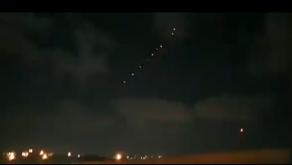 Palestinian 14.5mm anti-aircraft guns fire at Israeli Air Force jets carrying out a bombing run on the Gaza Strip - Sputnik International