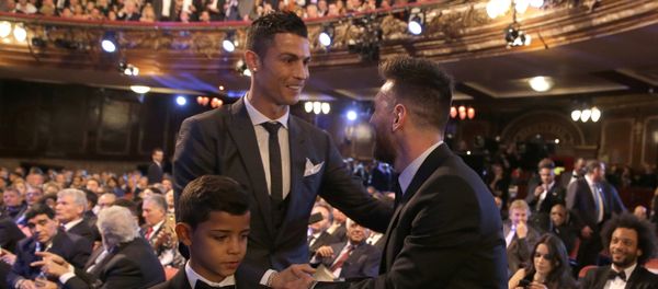 Portuguese soccer player Ronaldo, left, shakes hands with Argentine soccer player Lionel Messi during the The Best FIFA 2017 Awards at the Palladium Theatre in London, Monday, 23 October 2017. Portuguese soccer player Ronaldo, left, shakes hands with Argentine soccer player Lionel Messi during the The Best FIFA 2017 Awards at the Palladium Theatre in London, Monday, 23 October 2017. - Sputnik International
