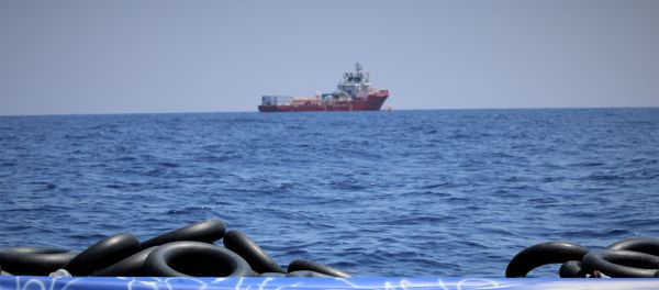 The migrant rescue ship Ocean Viking, run by French charities Medecins Sans Frontieres and SOS Mediterranee, floats in the distance, as it waits in international waters between Malta and the southern Italian island of Linosa for access to a port in this handout picture taken between August 9 and 12, 2019. Hannah Wallace Bowman/MSF/Handout via REUTERS ATTENTION EDITORS - THIS IMAGE HAS BEEN SUPPLIED BY A THIRD PARTY. MANDATORY CREDIT. The migrant rescue ship Ocean Viking, run by French charities Medecins Sans Frontieres and SOS Mediterranee, floats in the distance, as it waits in international waters between Malta and the southern Italian island of Linosa for access to a port in this handout picture taken between August 9 and 12, 2019. Hannah Wallace Bowman/MSF/Handout via REUTERS ATTENTION EDITORS - THIS IMAGE HAS BEEN SUPPLIED BY A THIRD PARTY. MANDATORY CREDIT. - Sputnik International