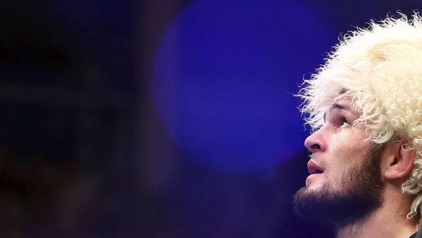 Russian UFC fighter Khabib Nurmagomedov speaks after wining against UFC fighter Dustin Poirier, of Lafayette, La., during Lightweight title mixed martial arts bout at UFC 242, in Yas Mall in Abu Dhabi, United Arab Emirates, early Sunday, Sept.8 2019. - Sputnik International