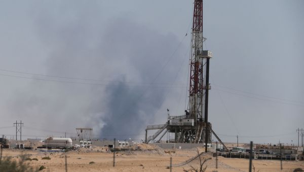 Smoke is seen following a fire at Aramco facility in the eastern city of Abqaiq, Saudi Arabia, September 14, 2019. - Sputnik International