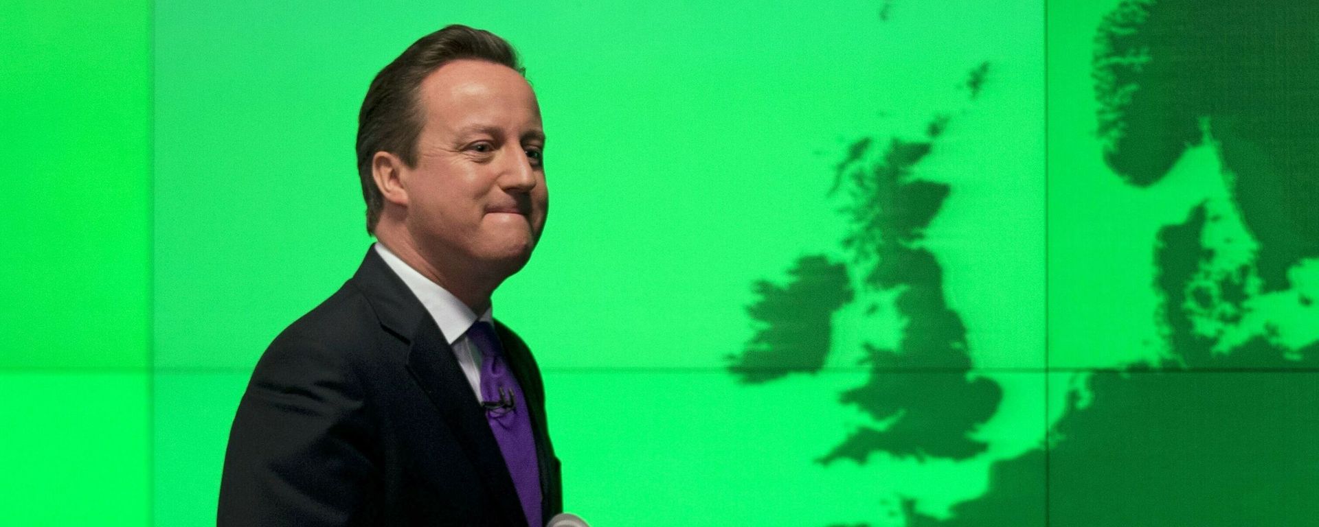 FILE - In this Wednesday, Jan. 23, 2013 file photo Britain's Prime Minister David Cameron walks past a map of Europe on a screen as he walks away after making a speech on holding a referendum on staying in the European Union in London. FILE - In this Wednesday, Jan. 23, 2013 file photo Britain's Prime Minister David Cameron walks past a map of Europe on a screen as he walks away after making a speech on holding a referendum on staying in the European Union in London. - Sputnik International, 1920, 25.02.2021