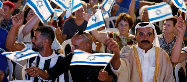 Supporters wave flags during an election campaign event of Benny Gantz, leader of Blue and White party, in Kfar Ahim, Israel, September 16, 2019. Supporters wave flags during an election campaign event of Benny Gantz, leader of Blue and White party, in Kfar Ahim, Israel, September 16, 2019. - Sputnik International