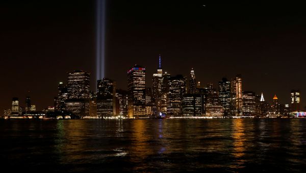 The Tribute in Light installation illuminates lower Manhattan, as seen from the borough of Brooklyn, marking the 18th anniversary of the 9/11 attacks in New York City, U.S., September 11, 2019 The Tribute in Light installation illuminates lower Manhattan, as seen from the borough of Brooklyn, marking the 18th anniversary of the 9/11 attacks in New York City, U.S., September 11, 2019 - Sputnik International