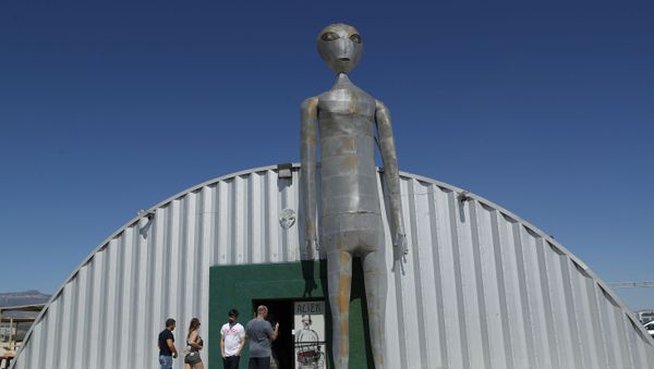 People enter and exit the Alien Research Center in Hiko, Nev. No one knows what to expect, but lots of people are preparing for Storm Area 51 on Wednesday, Sept. 18, 2019, in the Nevada desert - Sputnik International