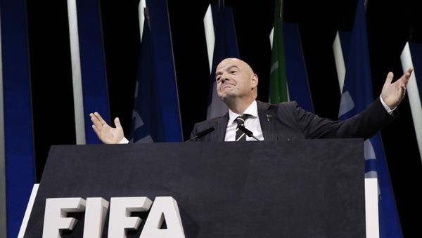 FIFA President Gianni Infantino gestures as he walks on the stage before the start of the 69th FIFA congress in Paris, Wednesday, June 5, 2019. FIFA President Gianni Infantino gestures as he walks on the stage before the start of the 69th FIFA congress in Paris, Wednesday, June 5, 2019. - Sputnik International