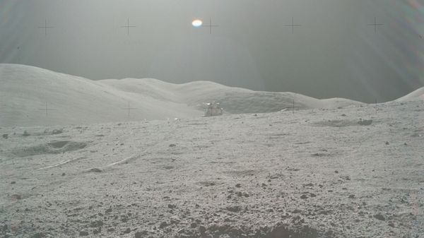 The crater containing sample 70019, with the Apollo 17 lunar module in the background. - Sputnik International