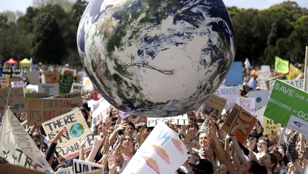 A large inflatable globe is bounced through the crowd as thousands of protestors, many of them school students, gather in Sydney, Friday, Sept. 20, 2019 A large inflatable globe is bounced through the crowd as thousands of protestors, many of them school students, gather in Sydney, Friday, Sept. 20, 2019 - Sputnik International