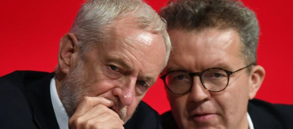Britain's opposition Labour Party leader Jeremy Corbyn, left, talks with deputy leader Tom Watson during the start of the party's annual conference in Liverpool, England Britain's opposition Labour Party leader Jeremy Corbyn, left, talks with deputy leader Tom Watson during the start of the party's annual conference in Liverpool, England - Sputnik International