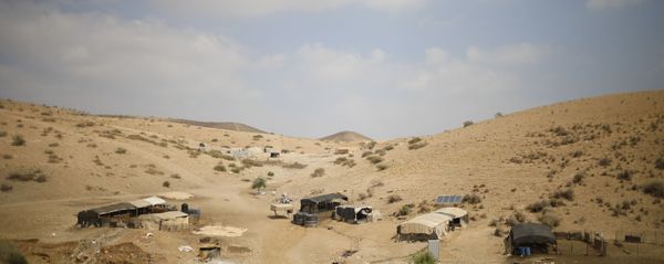 Palestinian Bedouin homes are seen in the Israeli-occupied West Bank, Wednesday, Sept. 11, 2019. Israeli Prime Minister Benjamin Netanyahu’s election eve vow to annex the Jordan Valley if he is re-elected has sparked an angry Arab rebuke and injected the Palestinians into a campaign that had almost entirely ignored them. (AP Photo/Ariel Schalit) Palestinian Bedouin homes are seen in the Israeli-occupied West Bank, Wednesday, Sept. 11, 2019. Israeli Prime Minister Benjamin Netanyahu’s election eve vow to annex the Jordan Valley if he is re-elected has sparked an angry Arab rebuke and injected the Palestinians into a campaign that had almost entirely ignored them. (AP Photo/Ariel Schalit) - Sputnik International