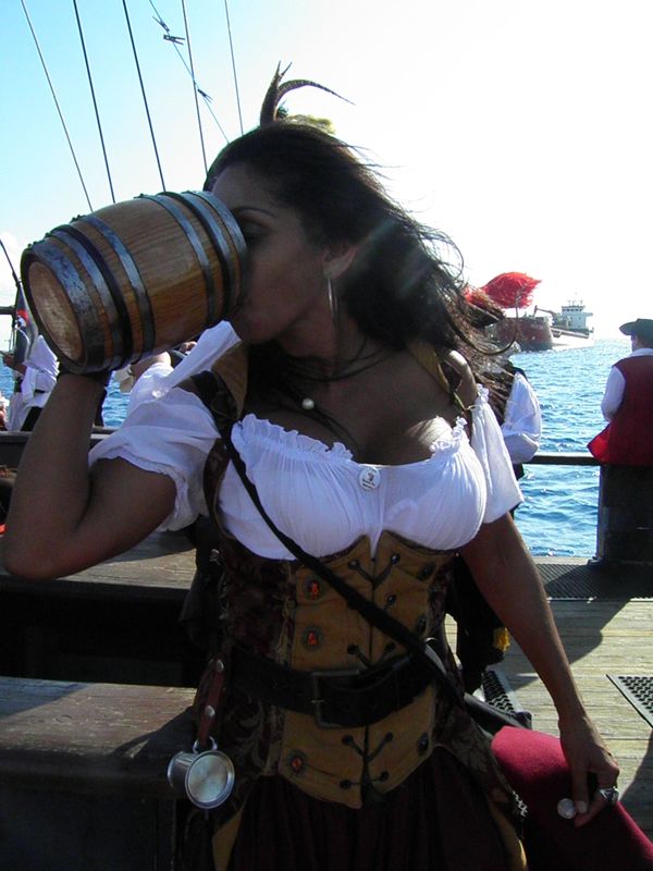 Girl drinks during the Pirates Week Festival in the Cayman Islands Girl drinks during the Pirates Week Festival in the Cayman Islands - Sputnik International