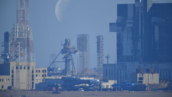 Russia's Soyuz-FG rocket booster carrying the Soyuz MS-15 spacecraft is transported from an assembling hangar to the launchpad ahead of its upcoming launch, at the Baikonur Cosmodrome, in Kazakhstan. - Sputnik International