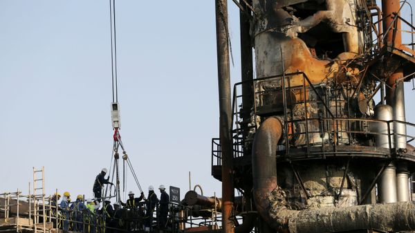 Workers are seen at the damaged site of Saudi Aramco oil facility in Abqaiq, Saudi Arabia, September 20, 2019 Workers are seen at the damaged site of Saudi Aramco oil facility in Abqaiq, Saudi Arabia, September 20, 2019 - Sputnik International