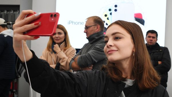 Start of sales of the new iPhone 11 line in a re:Store in central Moscow. Start of sales of the new iPhone 11 line in a re:Store in central Moscow. - Sputnik International