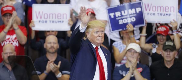 President Donald Trump waves to the crowd before exiting a campaign rally at U.S. Bank Arena, Thursday, Aug. 1, 2019, in Cincinnati. - Sputnik International