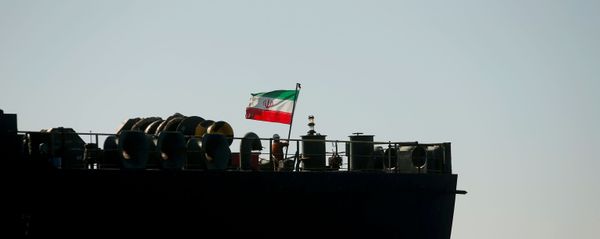 A crew member raises the Iranian flag at Iranian oil tanker Adrian Darya 1, formerly named Grace 1, as it sits anchored after the Supreme Court of the British territory lifted its detention order, in the Strait of Gibraltar, Spain, August 18, 2019. A crew member raises the Iranian flag at Iranian oil tanker Adrian Darya 1, formerly named Grace 1, as it sits anchored after the Supreme Court of the British territory lifted its detention order, in the Strait of Gibraltar, Spain, August 18, 2019. - Sputnik International