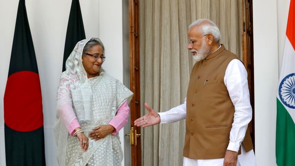 India's Prime Minister Narendra Modi shakes hands with his Bangladeshi counterpart Sheikh Hasina before their meeting at Hyderabad House in New Delhi, India, October 5, 2019.  - Sputnik International