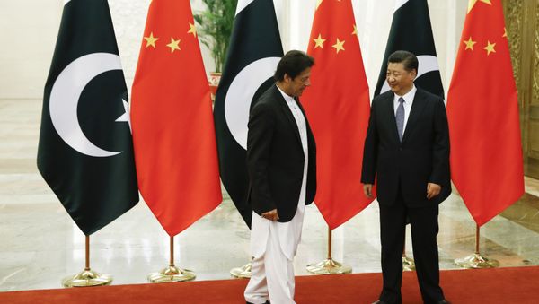 China's President Xi Jinping meets Pakistan's Prime Minister Imran Khan at the Great Hall of the People in Beijing, Friday, Nov. 2, 2018 - Sputnik International
