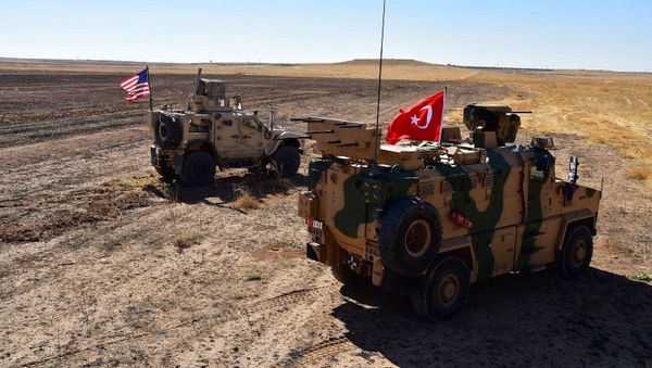 Turkish and U.S. military vehicles are seen on the Syrian-Turkish border during a joint U.S.-Turkey patrol near Tel Abyad, Syria, September 8, 2019 - Sputnik International
