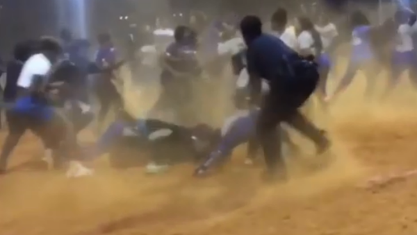 Massive, violent brawl breaks out at US high school softball game, which ultimately causes both teams to forfeit the Georgia High School Association state playoffs. - Sputnik International