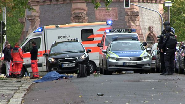 Police secures the area after a shooting in the eastern German city of Halle on October 9, 2019 Police secures the area after a shooting in the eastern German city of Halle on October 9, 2019 - Sputnik International