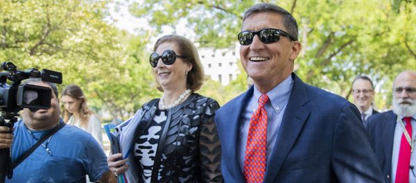 Michael Flynn, President Donald Trump's former national security adviser, leaves the federal court with his lawyer Sidney Powell, left, following a status conference with Judge Emmet Sullivan, in Washington, Tuesday, Sept. 10, 2019 - Sputnik International