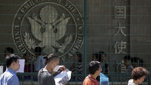 Visa applicants wait to enter the U.S. Embassy in Beijing, China, Thursday, July 26, 2018 - Sputnik International