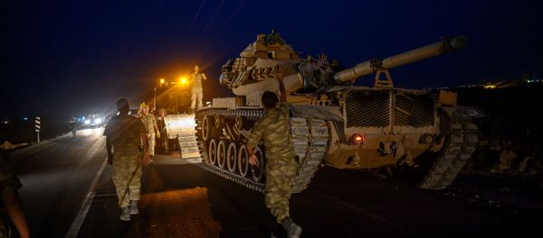 A Turkish army's tank drives down from a truck as Turkish armed forces drive towards the border with Syria near Akcakale in Sanliurfa province on October 8, 2019 A Turkish army's tank drives down from a truck as Turkish armed forces drive towards the border with Syria near Akcakale in Sanliurfa province on October 8, 2019 - Sputnik International