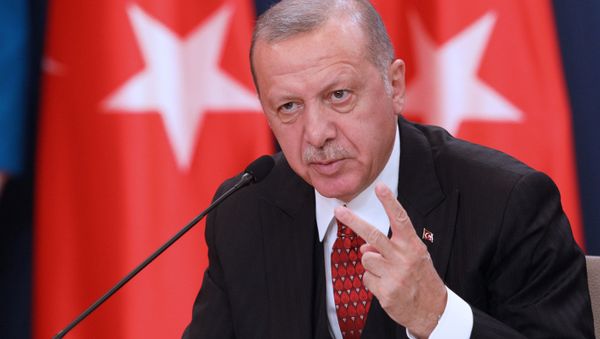Turkish President Tayyip Erdogan attends a joint press conference with Serbia's President Aleksandar Vucic after their meeting in Belgrade, Serbia, October 7, 2019 - Sputnik International