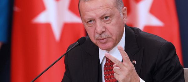 Turkish President Tayyip Erdogan attends a joint press conference with Serbia's President Aleksandar Vucic after their meeting in Belgrade, Serbia, October 7, 2019 Turkish President Tayyip Erdogan attends a joint press conference with Serbia's President Aleksandar Vucic after their meeting in Belgrade, Serbia, October 7, 2019 - Sputnik International