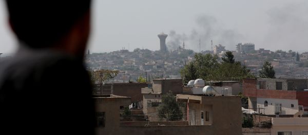 Tires are seen being burned in Syria's Qamishli  - Sputnik International