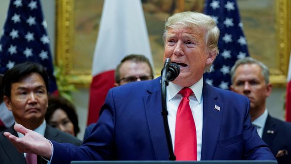 U.S. President Donald Trump speaks during signing ceremony for the U.S.-Japan Trade Agreement at White House in Washington - Sputnik International