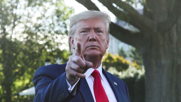 US President Donald Trump answers reporters' questions as he departs for campaign travel to Minnesota from the South Lawn of the White House in Washington, US, 10 October 2019.  - Sputnik International