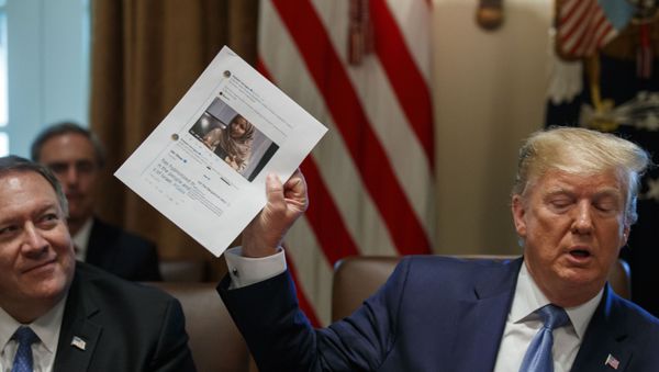 Secretary of State Mike Pompeo, left, looks at a paper held by President Donald Trump about Rep. Ilhan Omar, D-Minn., as Trump speaks during a Cabinet meeting in the Cabinet Room of the White House, Tuesday, July 16, 2019, in Washington - Sputnik International