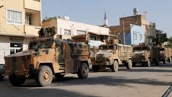 Turkish military vehicles drive to cross into Syria in the Turkish border town of Ceylanpinar in Sanliurfa province, Turkey, October 11, 2019 - Sputnik International