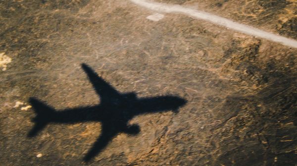 Plane Shadow - Sputnik International