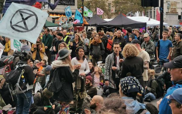 Activists begin chanting and singing at a sit-in in a major road outside Trafalgar Square in London, United Kingdom on Friday 11 October 2019 - Sputnik International