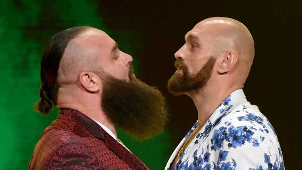 WWE wrestler Braun Strowman (L) and heavyweight boxer Tyson Fury face off during the announcement of their match at a WWE news conference at T-Mobile Arena on October 11, 2019 in Las Vegas, Nevada.  - Sputnik International