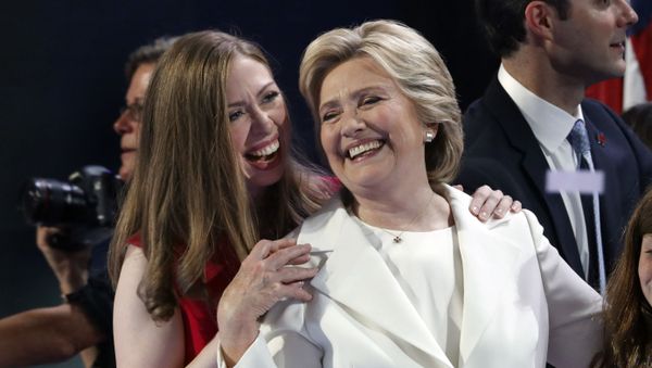 Democratic presidential candidate Hillary Clinton shares a moment on stage with daughter Chelsea at the Democratic National Convention in Philadelphia, Thursday, July 28, 2016 - Sputnik International