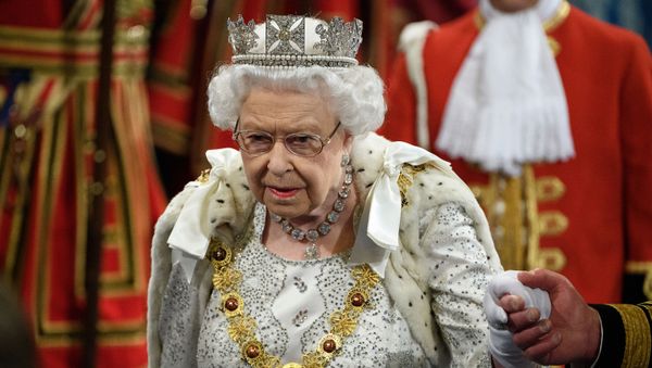 Britain's Queen Elizabeth proceeds through the Royal Gallery before the Queen's Speech during the State Opening of Parliament at the Palace of Westminster in London, Britain October 14, 2019 - Sputnik International