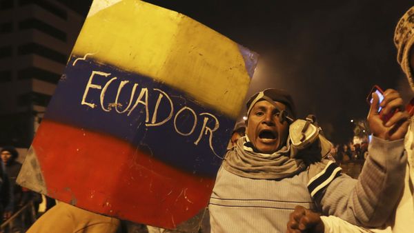 Indigenous and protesters celebrate the announcement that the government cancelled an austerity package that triggered violent protests, in Quito, Ecuador, Sunday, Oct. 13, 2019. Ecuadorian President Lenin Moreno and leaders of the country's indigenous peoples have struck a deal to cancel the disputed austerity package and end nearly two weeks of protests that have paralyzed the economy and left several people dead - Sputnik International