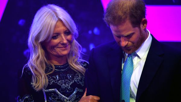 Britain's Prince Harry reacts next to television presenter Gaby Roslin as he delivers a speech during the WellChild Awards Ceremony reception in London, Britain, October 15, 2019 - Sputnik International