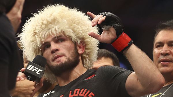 Russian UFC fighter Khabib Nurmagomedov speaks after wining against UFC fighter Dustin Poirier, of Lafayette, La., during Lightweight title mixed martial arts bout at UFC 242, in Yas Mall in Abu Dhabi, United Arab Emirates, Saturday , Sept.7 2019 - Sputnik International