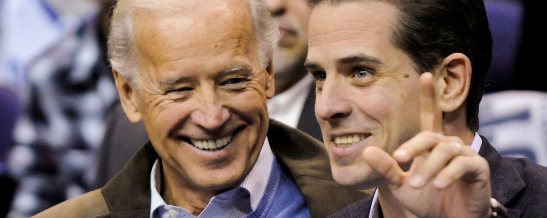 U.S. Vice President Joe Biden and his son Hunter Biden attend an NCAA basketball game between Georgetown University and Duke University in Washington, U.S., January 30, 2010. - Sputnik International, 1920, 28.10.2019