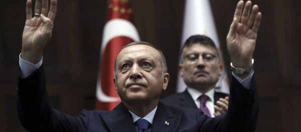 Turkish President Recep Tayyip Erdogan gestures as he addresses his ruling party legislators at the Parliament, in Ankara, Wednesday, Oct 16, 2019. - Sputnik International
